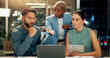 © peopleimages.com - Night, laptop and group of business people in training, planning and discussion for insurance. Computer, office and manager coaching team for help with project, financial policy and problem solving