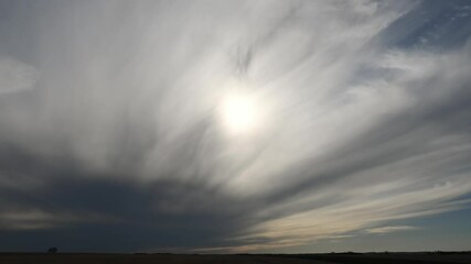 Wall Mural - Time lapse of dramatic radiating clouds as they slowly move towards the viewer
