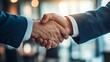 © masaidee - Meeting success. Two business persons shaking hands standing outside