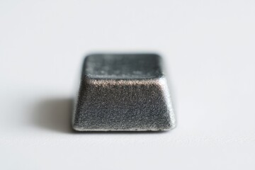 Poster - close-up of solitary vintage typewriter key isolated against stark white background