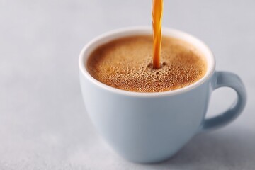 Poster - close-up of barista pouring freshly brewed coffee into cup