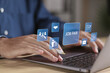 © Pakin - Job Fair concept. Employee recruitment and onboarding program. occupational, applicants, recruit, and hiring. Person use laptop with job fair icons on virtual screen.