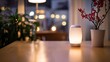© Qicol - Warm, ambient lighting illuminates a modern table decor.