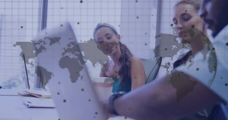 Poster - Colleagues collaborating around table in business meeting, displaying dotted world map overlay