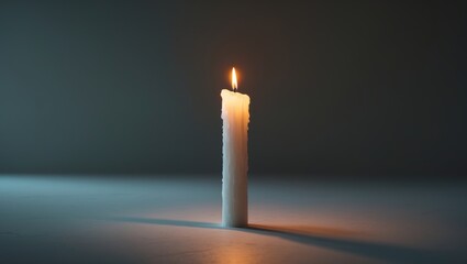 Aufkleber - A burning candle with a subdued background
