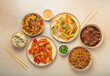 © somegirl - Assorted Chinese dishes, sweet and sour chicken, beef in sauce, noodles, fried rice, salad and wooden chopsticks. Chinese or Asian restaurant concept