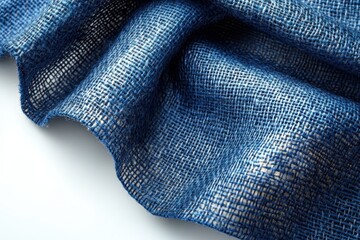 Poster - Deep blue fabric drapes softly showcasing texture and color variation under natural light in a casual setting