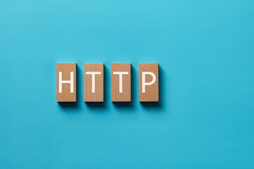 Poster - There is wood block with the word HTTP. It is an abbreviation for Hyper Text Transfer Protocol as eye-catching image.