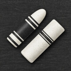 Poster - Artistic monochrome image of two erasers against a textured dark background.