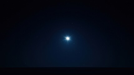 Wall Mural - A bright star shines in the dark night sky, surrounded by smaller stars above a faint horizon.