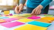 © peacehunter - Collaborative Professionals Creating Ideas on Sticky Notes