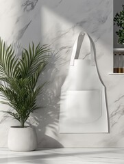 Poster - White apron hanging on marble wall next to potted plant in studio shot with natural light and shadows for mockup