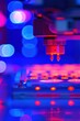 © Smoky - Automated laboratory machine in operation close up in blue and red light for medical research and development with robotic arm