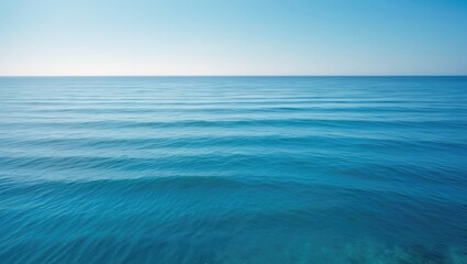 Poster - Scenic seascape featuring a bright blue sea, waves, and a clear sky