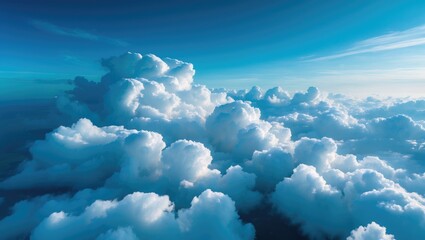 Wall Mural - Overview of the coast from above with cloud cover and a bright sky