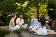 © Rido - Group of holistic people talking to each in relax