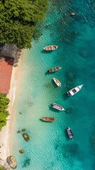 Poster - Several wooden boats are gently floating on the crystal clear turquoise water near a tropical beach, creating a serene and idyllic scene, perfect for relaxing and enjoying the beauty of nature