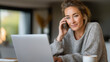 © Denis Yevtekhov - Working mom multitasking in a cozy home office setting