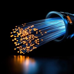 Poster - Bright light bulb emitting blue and orange light in a dark environment creating visual contrast