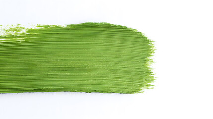 Wall Mural - Green paint brush stroke on on white background