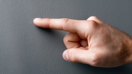 Poster - Hand pointing at a button emphasizing tactile index as a concept of sensation beyond visual perception