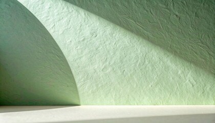Poster - Dynamic shadows on textured green surface minimalist interior photography modern setting close-up perspective abstract concept for visual appeal