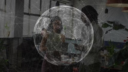 Poster - Team collaborating on data visualization in open-plan office with holographic network sphere