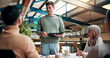 © Jessy25/peopleimages.com - Presentation, group and man with documents, boardroom and brand specialist with ideas for project. Business, teamwork and people with strategy for target audience, trends and speech for workshop