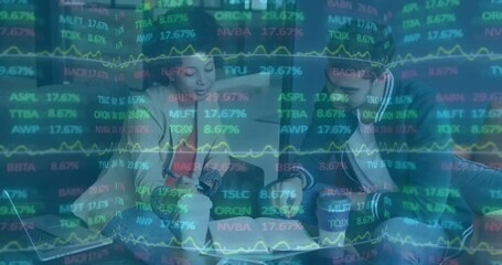 Poster - Female and male colleagues collaborating in modern lounge, taking notes with floating stock tickers
