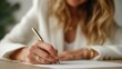 © pier - blonde woman white blazer signing papers closeup faceless beige background business official elegant