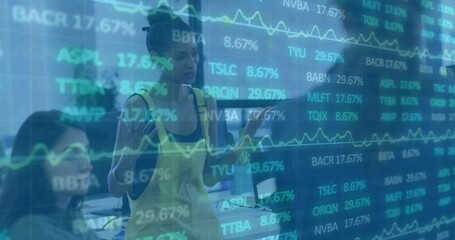 Poster - Woman using smartphone discussing stock data with male colleague in office, showing live graphs