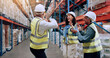 © peopleimages.com - Man, group and dancing for logistics at warehouse, smile and success with motivation, team and support. People, mentor and women with applause, celebration and goal for supply chain at storage plant