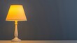 © CoreVisuals - A warm table lamp glows softly against a plain blue wall, creating a cozy, minimalist atmosphere.
