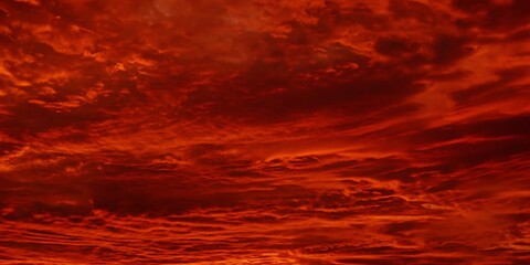 abstract dark red background. dramatic red sky. red sunset with clouds. fantastic sunset background 
