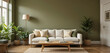 © Hanudarling - Cozy Scandinavian living room featuring olive green walls, a cream fabric sofa, and a teak coffee table. Warm wood floors and indoor ferns create a grounded, natural aesthetic.