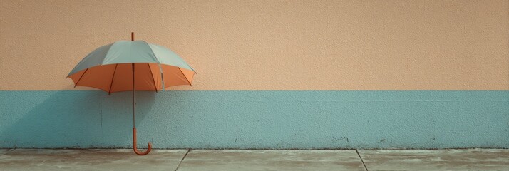 Aufkleber - Umbrella Rests Against Pastel Wall With Empty Upper Space and Subtle Shadows in a Quiet Urban Setting Generative AI