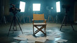 © john - Director’s chair on a film set, surrounded by script pages scattered on the ground, light stands and cameras in the background