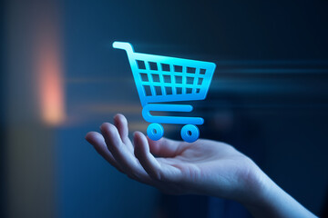 Poster - Blue shopping cart icon hovers above an open hand, symbolizing online shopping, e-commerce, and digital purchasing ease
