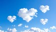 © EnelEva - Heart shaped clouds floating in a bright blue sky