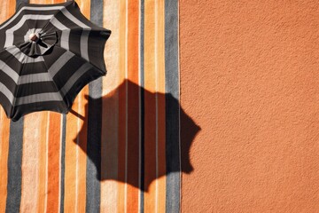 Poster - Summer Relaxation With Shadow of Beach Umbrella on Striped Towel at Sunny Seaside Location Generative AI