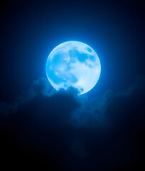 luminous blue moon bathes in the night sky, generative ai