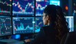 © Sabein - Focused Businesswoman Analyzing Stock Market Data at Night