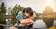 © peopleimages.com - River, mother and child with hug for kayak, water activity or adventure for bonding together. Lake, mom and happy kid with learning for canoeing, travel holiday and paddle outdoor as family in boat