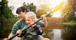 © peopleimages.com - River, child and woman with teaching for kayak, water activity and adventure in summer camp. Lake, female instructor and girl with learning for canoeing, skills development and paddle outdoor in boat