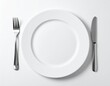 © Dian - Empty White Plate With Fork And Knife On White Table