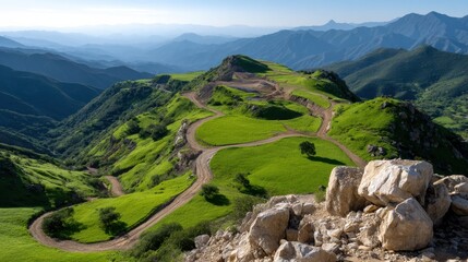 Aufkleber - A mountain road with a green grassy hillside