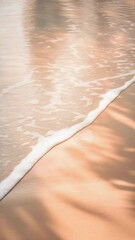 Poster - Soft ocean waves gently washing over a sandy beach, with palm tree shadows creating a serene and peaceful atmosphere during the captivating sunset hours
