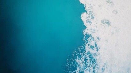 Aufkleber - Aerial view of a beautiful seascape with turquoise water and white foam creating a stunning contrast, perfect for backgrounds and designs related to nature, travel, and relaxation
