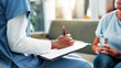 © peopleimages.com - Nurse, hands and writing with patient for counseling, therapy or consultation at old age home. Person, caregiver or health therapist taking notes with clipboard or client for symptoms or diagnosis