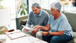 © FrameFlex/peopleimages.com - Discussion, finance documents and senior couple in home with debt, mortgage or bills with budget payment. Conversation, paperwork and elderly man with woman for planning retirement account in house.